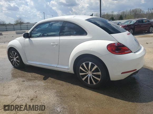 2013 Volkswagen Beetle 2.5L with VIN 3VWJP7ATXDM662072, listed as a Copart auction lot 52197655 with 86,725 mi miles and Non Repairable. Bid and sale history available at DreamBid. Image 2.