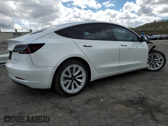 2022 Tesla Model 3 Long Range z VIN 5YJ3E1EB7NF365962, wystawiony jako Copart lot #48601865 z przebiegiem 121 541 mil mil oraz Szkoda całkowita • Salvage title. Historia ofert i sprzedaży dostępna na DreamBid. Obrazek 3.