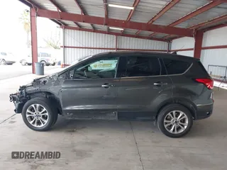 2019 Ford Escape SE with VIN 1FMCU0GD9KUB79835, listed as a IAAI auction lot 42014806 with 130,324 mi miles. Bid and sale history available at carsss.com. Image 15.