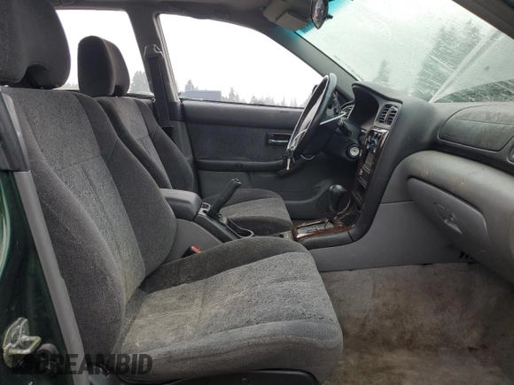 2000 Subaru Legacy with VIN 4S3BE6453Y7215569, listed as a Copart auction lot 81493564 with 218,045 mi miles and Salvage title. Bid and sale history available at DreamBid. Image 7.