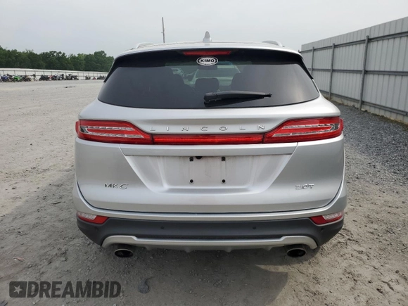 2017 Lincoln MKC Premiere with VIN 5LMCJ1C91HUL32617, listed as a Copart auction lot 57444215 with 106,285 mi miles and Salvage title. Bid and sale history available at DreamBid. Image 6.