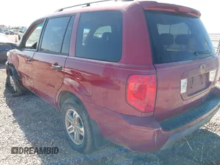 2005 Honda Pilot EX-L with VIN 5FNYF18505B022497, listed as a IAAI auction lot 41994385 with 199,143 mi miles. Bid and sale history available at carsss.com. Image 3.