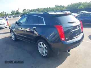 2014 Cadillac SRX Performance Collection with VIN 3GYFNCE39ES613051, listed as a IAAI auction lot 42113063 with 82,952 mi miles and . Bid and sale history available at carsss.com. Image 3.