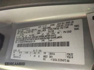 2013 Ford Econoline Cargo Commercial with VIN 1FTNE2EW4DDA30116, listed as a IAAI auction lot 42040770 with 88,468 mi miles and . Bid and sale history available at DreamBid. Image 9.