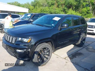 2017 Jeep Grand Cherokee Laredo with VIN 1C4RJFAGXHC817666, listed as a IAAI auction lot 42036817 with 119,698 mi miles. Bid and sale history available at carsss.com. Image 2.