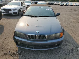 2003 BMW 3 Series 325Ci with VIN WBABS33413PG92865, listed as a Copart auction lot 70243054 with 191,297 mi miles and Salvage Title. Bid and sale history available at carsss.com. Image 5.