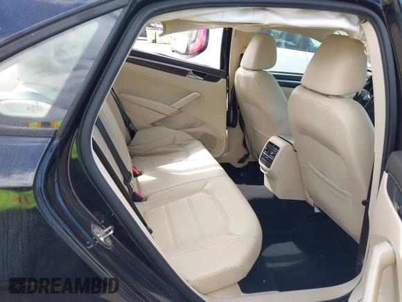 2019 Volkswagen Passat 2.0T Wolfsburg Edition with VIN 1VWLA7A34KC012694, listed as a IAAI auction lot 41579392 with 80,846 mi miles. Bid and sale history available at carsss.com. Image 8.
