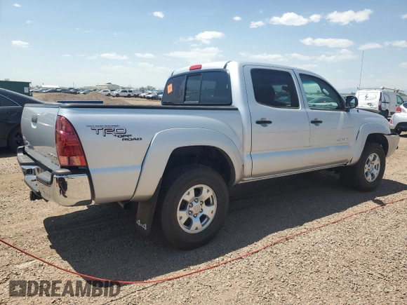 2006 Toyota Tacoma with VIN 5TELU42N76Z283409, listed as a Copart auction lot 61391785 with 77,799 mi miles and Salvage title. Bid and sale history available at DreamBid. Image 3.