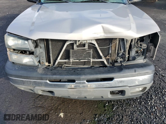 2005 Chevrolet Silverado 1500 Z71 z VIN 1GCEK19B65E242246, wystawiony jako Copart lot #80337234 z przebiegiem 320 619 mil mil oraz Szkoda całkowita • Salvage title. Historia ofert i sprzedaży dostępna na DreamBid. Obrazek 13.