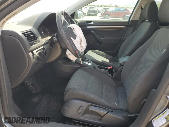 2010 Volkswagen Jetta S with VIN 3VWJZ7AJ2AM005738, listed as a Copart auction lot 55462935 with 173,514 mi miles and Salvage title. Bid and sale history available at DreamBid. Image 7.