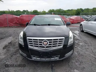 2014 Cadillac XTS Luxury z VIN 2G61N5S38E9292684, wystawiony jako IAAI lot #41842596 z przebiegiem 130 318 mil mil oraz . Historia ofert i sprzedaży dostępna na DreamBid. Obrazek 12.