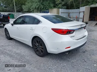 2014 Mazda 6 i Grand Touring with VIN JM1GJ1W67E1139945, listed as a IAAI auction lot 42194243 with 205,545 mi miles. Bid and sale history available at carsss.com. Image 3.