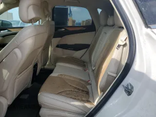 2015 Lincoln MKC z VIN 5LMCJ1A94FUJ19967, wystawiony jako Copart lot #58873665 z przebiegiem Nie podano mil oraz Szkody całkowita. Historia ofert i sprzedaży dostępna na DreamBid. Obrazek 11.