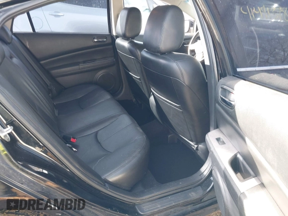 2009 Mazda 6 S Grand Touring with VIN 1YVHP82B195M23577, listed as a IAAI auction lot 41491398 with 180,512 mi miles and . Bid and sale history available at DreamBid. Image 8.
