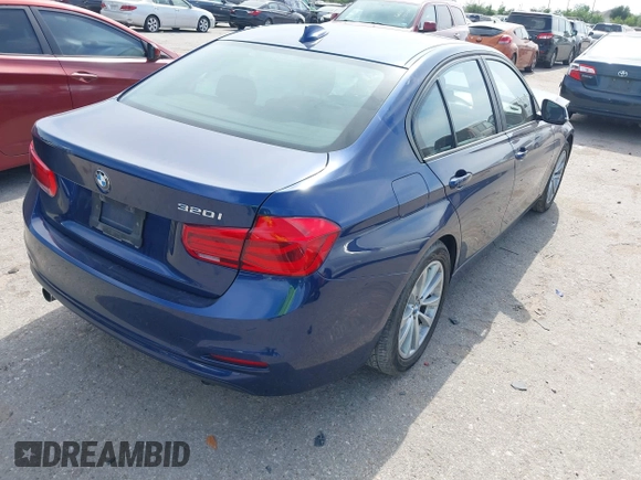 2018 BMW 3 Series 320i with VIN WBA8E1G56JNU92997, listed as a IAAI auction lot 42039869 with 105,085 mi miles. Bid and sale history available at carsss.com. Image 4.