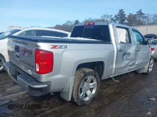 2018 Chevrolet Silverado 1500 LTZ with VIN 3GCUKSECXJG536316, listed as a IAAI auction lot 41432469 with 127,276 mi miles. Bid and sale history available at carsss.com. Image 4.
