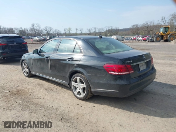 2014 Mercedes-Benz E E 350 Luxury with VIN WDDHF8JB2EA894977, listed as a IAAI auction lot 42065062 with 197,393 mi miles. Bid and sale history available at carsss.com. Image 3.