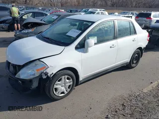2010 Nissan Versa 1.8 S with VIN 3N1BC1AP8AL465537, listed as a IAAI auction lot 41762115 with 163,533 mi miles and . Bid and sale history available at carsss.com. Image 2.