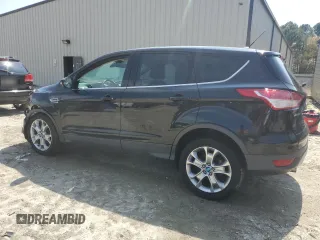 2013 Ford Escape SEL with VIN 1FMCU0HX4DUC48961, listed as a Copart auction lot 52630795 with 179,786 mi miles and Salvage Title. Bid and sale history available at DreamBid. Image 2.
