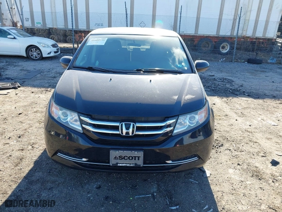2016 Honda Odyssey SE with VIN 5FNRL5H34GB139571, listed as a IAAI auction lot 41602695 with 118,960 mi miles. Bid and sale history available at carsss.com. Image 12.