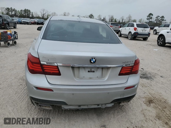 2013 BMW 7 Series 750Li z VIN WBAYE8C56DD133044, wystawiony jako Copart lot #49092615 z przebiegiem 169 699 mil mil oraz Szkoda całkowita • Salvage title. Historia ofert i sprzedaży dostępna na DreamBid. Obrazek 6.