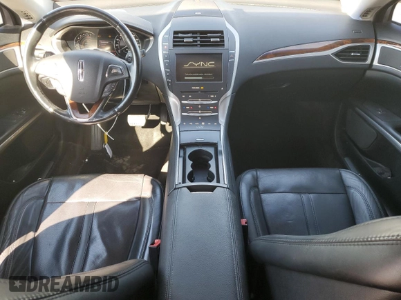 2015 Lincoln MKZ z VIN 3LN6L2G9XFR610736, wystawiony jako Copart lot #80662274 z przebiegiem 101 441 mil mil oraz Szkoda całkowita • Salvage title. Historia ofert i sprzedaży dostępna na DreamBid. Obrazek 8.