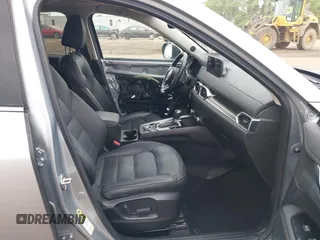 2021 Mazda CX-5 Grand Touring with VIN JM3KFBDM4M0371496, listed as a IAAI auction lot 42428860 with 113,735 mi miles and . Bid and sale history available at DreamBid. Image 5.