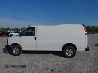 2021 Chevrolet Express Cargo Van with VIN 1GCWGAFP0M1206242, listed as a IAAI auction lot 42043866 with 148,087 mi miles. Bid and sale history available at carsss.com. Image 14.