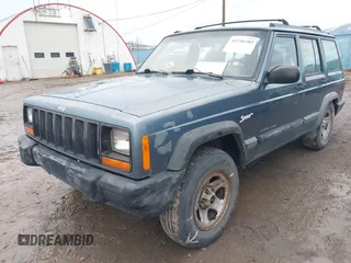 1997 Jeep Cherokee Sport with VIN 1J4FJ68S9VL607515, listed as a IAAI auction lot 41216502 with 238,274 mi miles. Bid and sale history available at carsss.com. Image 6.