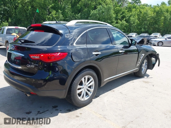 2015 Infiniti QX70 with VIN JN8CS1MW1FM482625, listed as a IAAI auction lot 42332365 with 88,912 mi miles and . Bid and sale history available at DreamBid. Image 4.