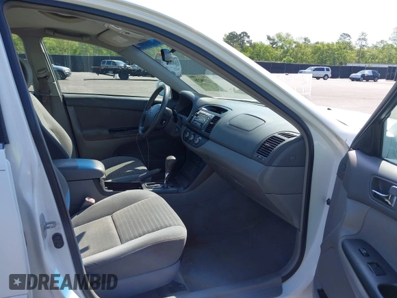 2006 Toyota Camry STD with VIN 4T1BE32KX6U734944, listed as a IAAI auction lot 42006245 with 243,967 mi miles. Bid and sale history available at carsss.com. Image 5.
