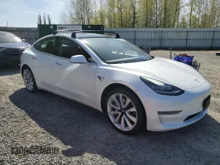 2019 Tesla Model 3 Mid Range with VIN 5YJ3E1EA0KF484178, listed as a Copart auction lot 53121915 with 64,929 mi miles and Salvage Title. Bid and sale history available at DreamBid. Image 4.