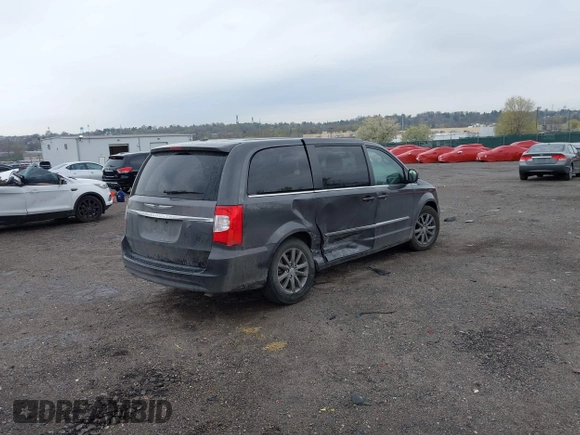 2015 Chrysler Town & Country S with VIN 2C4RC1HG7FR522449, listed as a IAAI auction lot 42021311 with 107,391 mi miles. Bid and sale history available at carsss.com. Image 4.