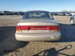 1999 Saturn SL with VIN 1G8ZK5270XZ147170, listed as a Copart auction lot 42169385 with 141,100 mi miles and Clean title. Bid and sale history available at DreamBid. Image 6.