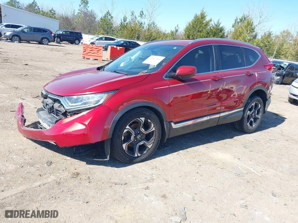2019 Honda CR-V Touring with VIN 2HKRW1H9XKH500025, listed as a IAAI auction lot 41667564 with 73,889 mi miles. Bid and sale history available at carsss.com. Image 2.
