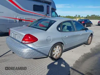 2006 Ford Taurus z VIN 1FAHP56U56A216490, wystawiony jako IAAI lot #41142565 z przebiegiem 189 796 mil mil oraz . Historia ofert i sprzedaży dostępna na DreamBid. Obrazek 4.