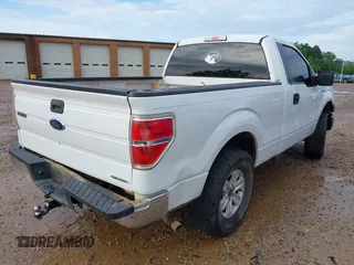 2014 Ford F-150 XL with VIN 1FTMF1CM7EFC60291, listed as a IAAI auction lot 42503556 with 215,474 mi miles and . Bid and sale history available at DreamBid. Image 4.