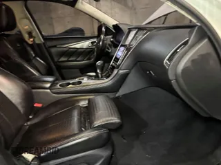 2014 Infiniti Q50 Sport with VIN JN1BV7AP7EM689505, listed as a IAAI auction lot 42172352 with 133,824 mi miles and . Bid and sale history available at DreamBid. Image 5.
