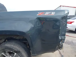 2017 Chevrolet Colorado z VIN 1GCHSDEA4H1201640, wystawiony jako IAAI lot #42299847 z przebiegiem 105 647 mil mil oraz . Historia ofert i sprzedaży dostępna na DreamBid. Obrazek 18.