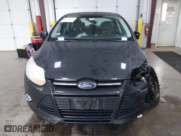 2012 Ford Focus SE с VIN 1FAHP3F22CL394151, выставлен на аукционе IAAI как лот 42146644 с пробегом 79 433 миль миль и . История ставок и продаж доступна на DreamBid. Изображение 13.