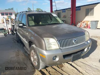2002 Mercury Mountaineer with VIN 4M2DU86W62UJ34436, listed as a IAAI auction lot 41643664 with 56,871 mi miles and . Bid and sale history available at DreamBid. Image 1.