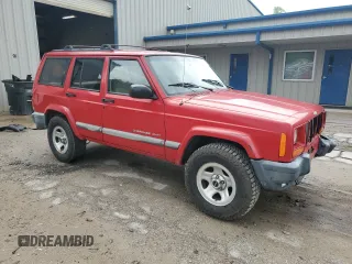 2001 Jeep Cherokee Sport with VIN 1J4FT48S41L570480, listed as a Copart auction lot 56123925 with 216,338 mi miles and Salvage title. Bid and sale history available at DreamBid. Image 4.