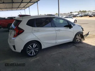 2015 Honda Fit EX-L с VIN 3HGGK5H86FM768802, выставлен на аукционе Copart как лот 58940725 с пробегом Не указан миль и Списание • Salvage title. История ставок и продаж доступна на DreamBid. Изображение 3.