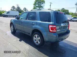 2012 Ford Escape Limited with VIN 1FMCU0EG5CKC45498, listed as a IAAI auction lot 42010238 with 158,531 mi miles. Bid and sale history available at carsss.com. Image 3.