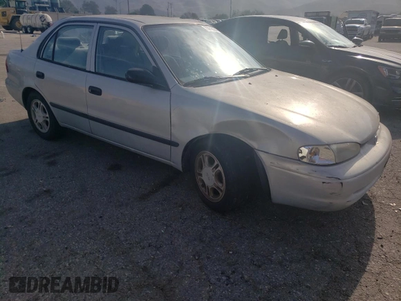 2001 Chevrolet Prizm z VIN 1Y1SK52811Z447352, wystawiony jako Copart lot #73916394 z przebiegiem 89 265 mil mil oraz Szkoda całkowita • Salvage title. Historia ofert i sprzedaży dostępna na DreamBid. Obrazek 4.