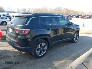 2018 Jeep Compass Limited z VIN 3C4NJCCBXJT140580, wystawiony jako IAAI lot #41797010 z przebiegiem 144 035 mil mil oraz . Historia ofert i sprzedaży dostępna na DreamBid. Obrazek 4.