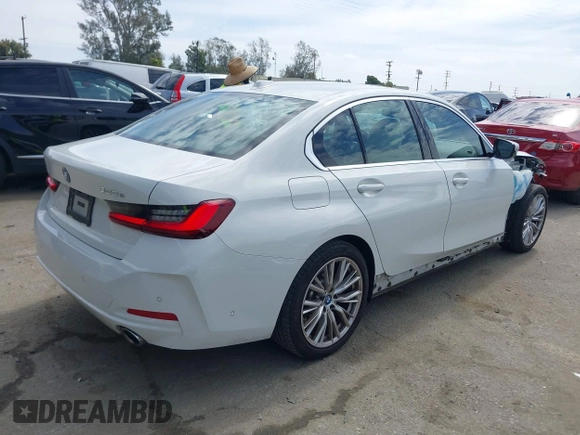 2024 BMW 3 Series 330e with VIN 3MW39FF00R8D79501, listed as a IAAI auction lot 41814127 with 17,392 mi miles. Bid and sale history available at carsss.com. Image 4.