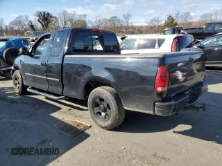 2002 Ford F-150 XL with VIN 1FTRX17W52NB83825, listed as a Copart auction lot 85794444 with 0 mi miles and Salvage Title. Bid and sale history available at carsss.com. Image 2.