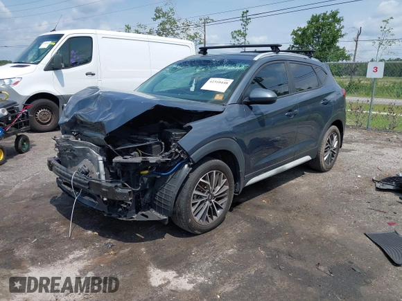 2019 Hyundai Tucson Sport z VIN KM8J33AL3KU937888, wystawiony jako IAAI lot #42310448 z przebiegiem 99 501 mil mil oraz . Historia ofert i sprzedaży dostępna na DreamBid. Obrazek 2.