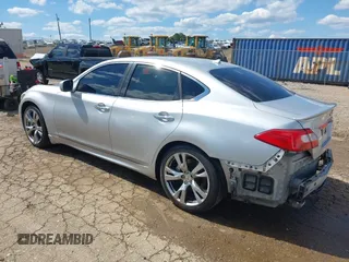 2013 Infiniti M with VIN JN1BY1AP0DM513527, listed as a IAAI auction lot 42170513 with 194,908 mi miles and . Bid and sale history available at DreamBid. Image 3.